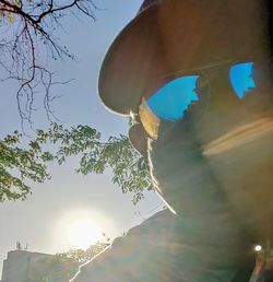 Low angle view of sunglasses against sky on sunny day