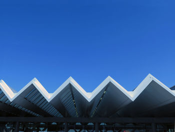 Low angle view of building against blue sky