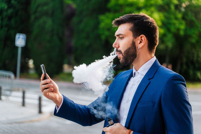 Young man using mobile phone