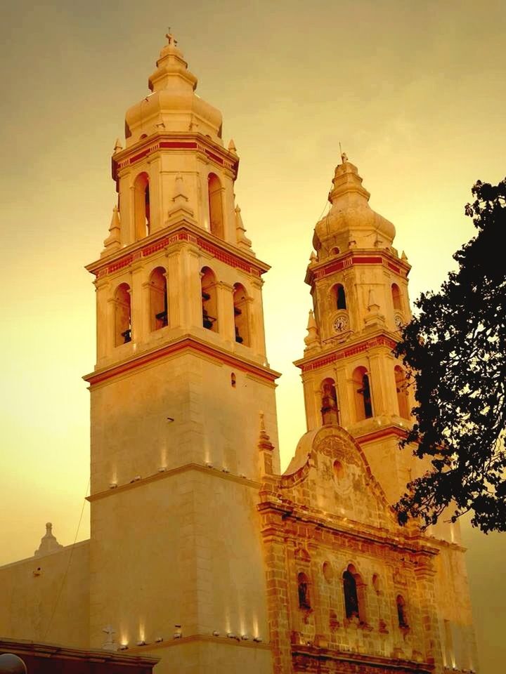 architecture, building exterior, built structure, place of worship, religion, church, spirituality, low angle view, cathedral, sky, clock tower, tower, history, travel destinations, famous place, travel, dome, steeple