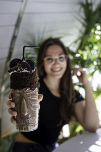 Portrait of a smiling young woman