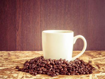 Close-up of coffee cup on table