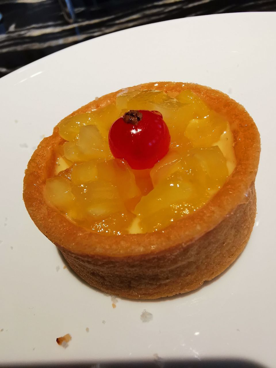 CLOSE-UP OF DESSERT IN PLATE ON TABLE