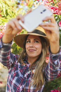 Young woman making a selfie in the country