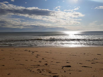 Scenic view of beach against sky