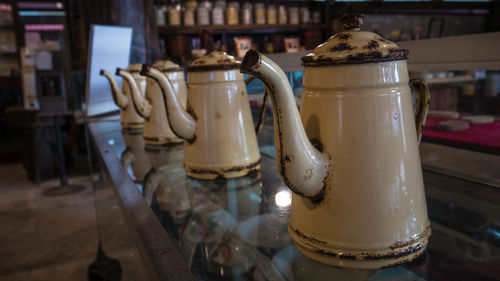 Close-up of drink in glass jar on table