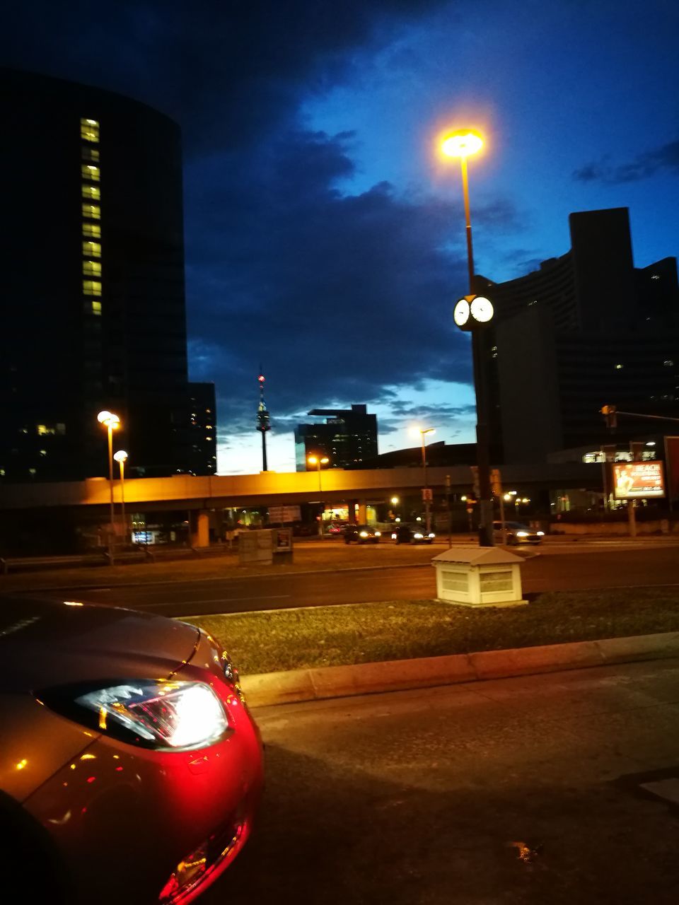 illuminated, building exterior, architecture, street light, built structure, sky, night, street, outdoors, road, no people, city, red