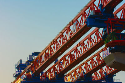 Low angle view of bridge against clear sky