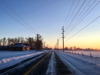 Road against sky during winter