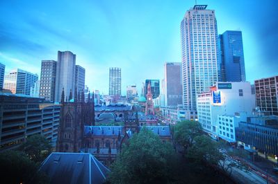 Modern cityscape against clear sky