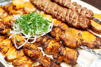 High angle view of meat in plate on table