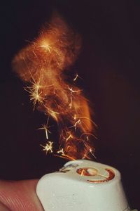 Close-up of hand holding fireworks