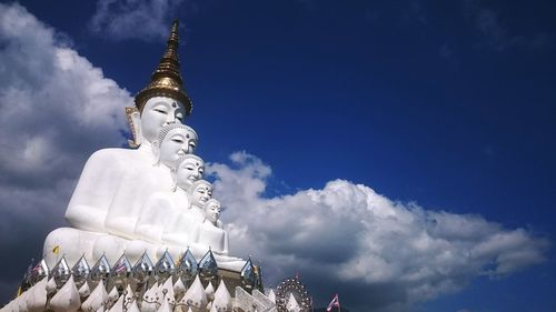 Low angle view of statue against sky