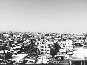 Cityscape against clear sky