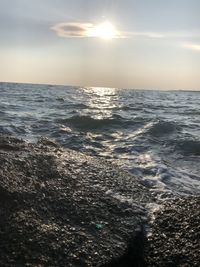 Scenic view of sea against sky during sunset