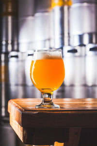 Close-up of beer glass on table