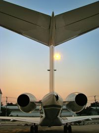 Low angle view of street light at sunset