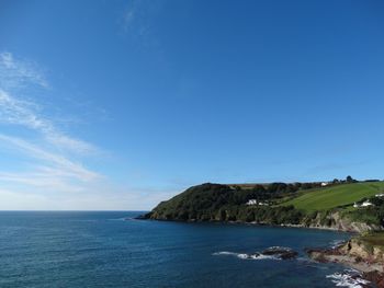 Scenic view of sea and blue sky