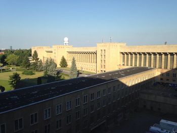 Buildings against clear sky