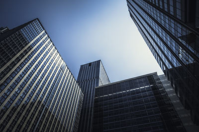 Low angle view of modern buildings against sky