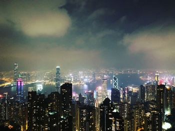 Illuminated buildings in city at night