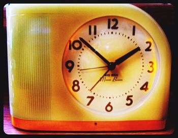 Close-up of clock on the wall