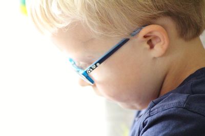 Close-up portrait of boy looking away