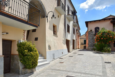 A narrow street between the houses of ruviano, a small village in the province of caserta in italy.