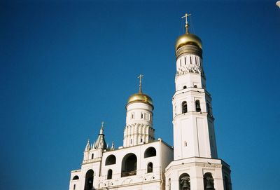 Low angle view of building against blue sky