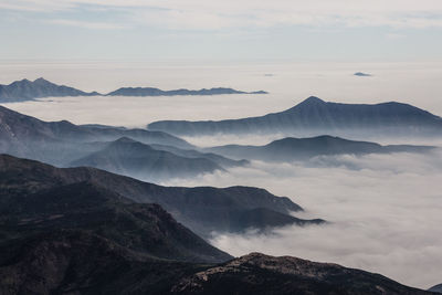 Aerial view of mountains in foggy weather