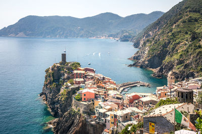 High angle view of townscape by sea