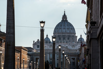 Panoramic view of buildings in city against sky