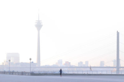 Rheinturm tower in foggy weather