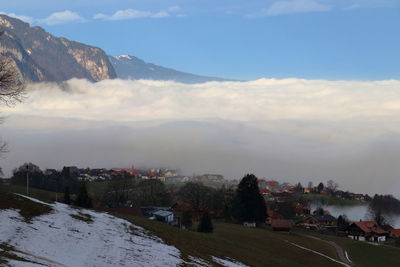 Scenic view of snowcapped mountains against sky