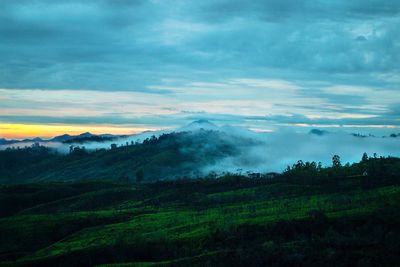 Scenic view of landscape against sky during sunset