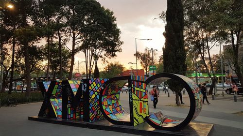 Multi colored trees in city
