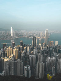 Aerial view of city buildings against sky