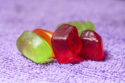 Close-up of multi colored candies on table