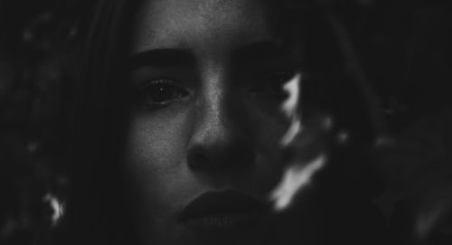 Close-up portrait of young woman
