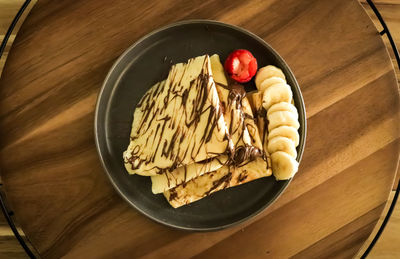 High angle view of breakfast served on table