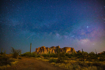 Scenic view of star field against sky at night