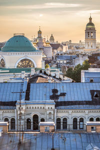 Buildings in city against sky