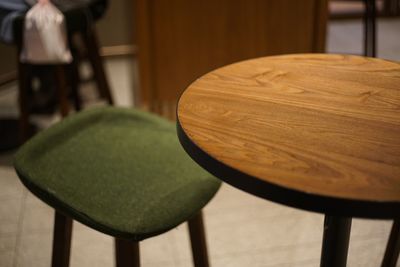 Close-up of empty chair on table at home