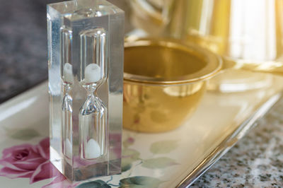 Close-up of glass jar on table