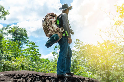 Low angle view of man standing on field