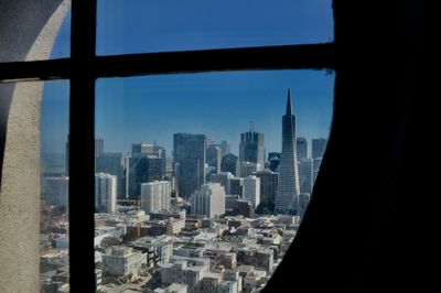 Cityscape seen through window