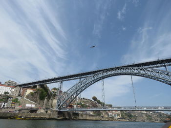 Low angle view of dom luis i bridge against sky
