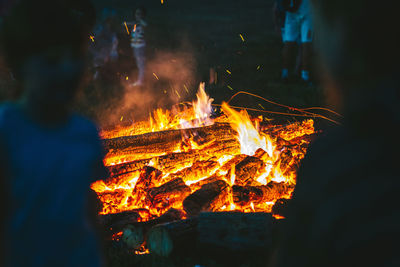 Close-up of fire burning at night