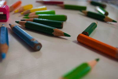 High angle view of colored pencils on table