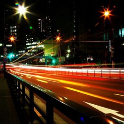 Light trails on city street at night